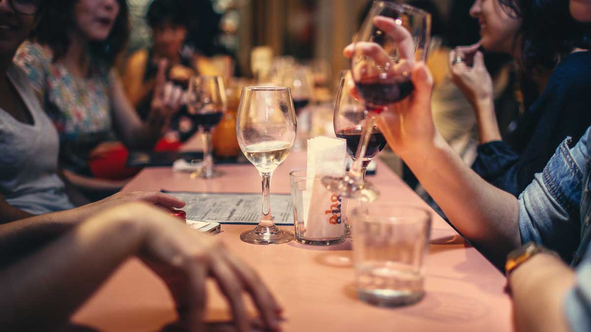 Photo Credit: Helena Lopes. Social gathering, discussion, drinking wine