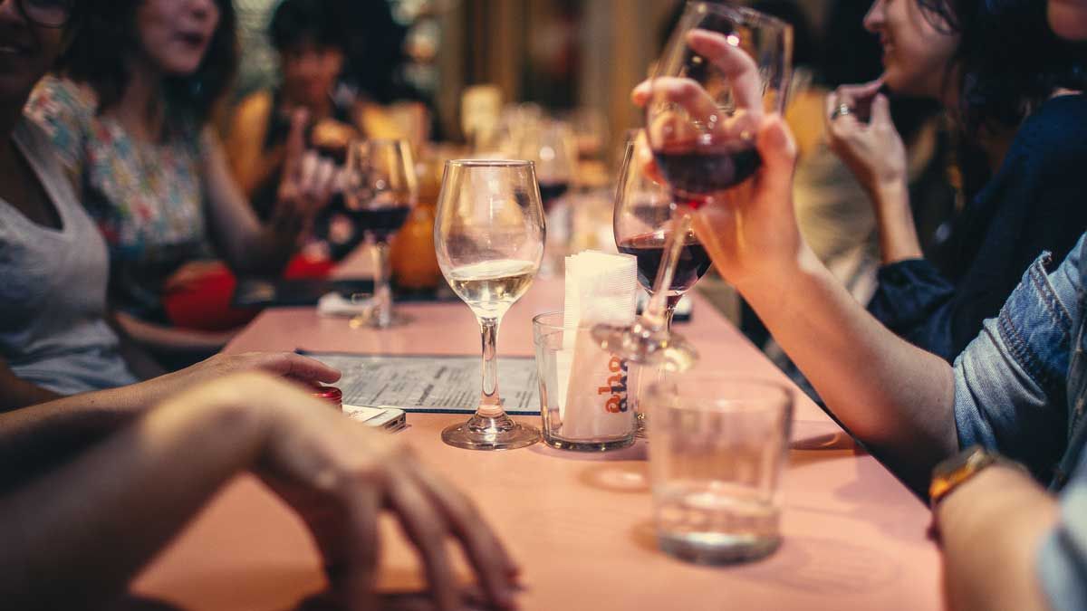 Photo Credit: Helena Lopes. Social gathering, discussion, drinking wine